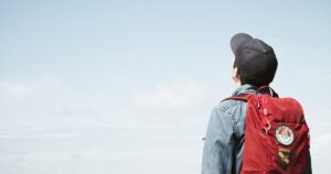 Student looking up at sky