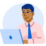 A smiling man sits behind an open laptop.