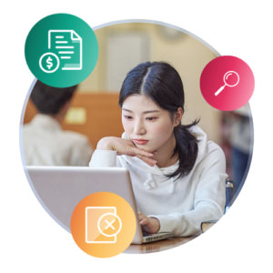 International student looking at a laptop