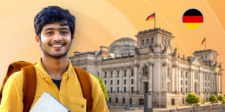 A smiling student wearing a backpack stands in front of a multistorey building with a German flag on top.