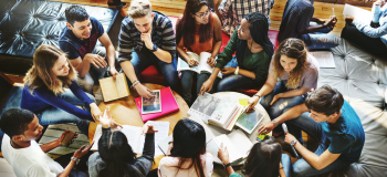 Students working at tables