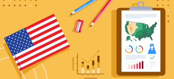 A US flag, some school supplies, and a clipboard showing a topographical map of the US with some graphs.