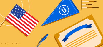 A pennant, a degree, a US flag, and a ballpoint pen.