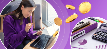 A female international student holds her phone while sitting in front of a laptop, planning a budget for study abroad. She is framed by illustrated coins, and a photograph of a calculator, spreadsheets, and budget books.