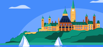 Parliament Hill in Ottawa, Canada with two sailboats on the river.