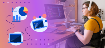 A student (a young White woman in a wheelchair wearing a bright yellow shirt, overalls, glasses, and headphones) codes at a desktop computer.