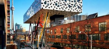 OCAD University (an impressive silver cube building towers over multistorey brick buildings in downtown Toronto.)
