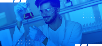 A photo of a student holding a science beaker.