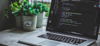 Open laptop with coding