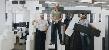 ApplyBoard Staff in Office with Giant Lego Blocks
